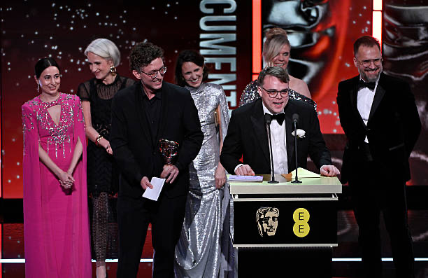 Agency client team accepting the BAFTA Award for Best Documentary